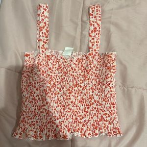 Orange cheetah print with white tank top, scrunchie material